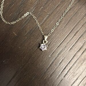 Costume jewelry necklace single stone